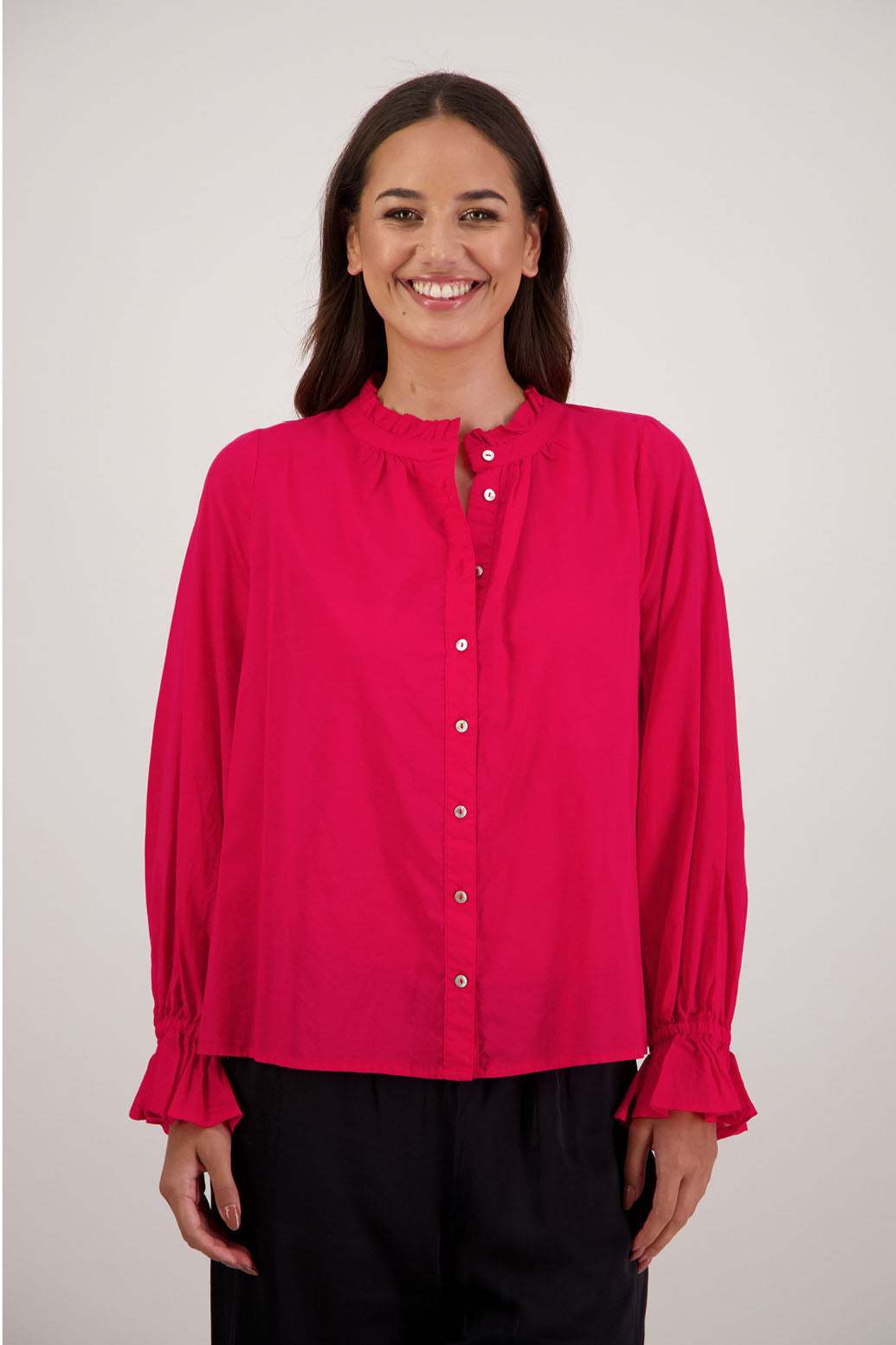 Briarwood NZ.Red long sleeve shirt, Elasticated sleeves, Ruffles around neck, Buttoned through
