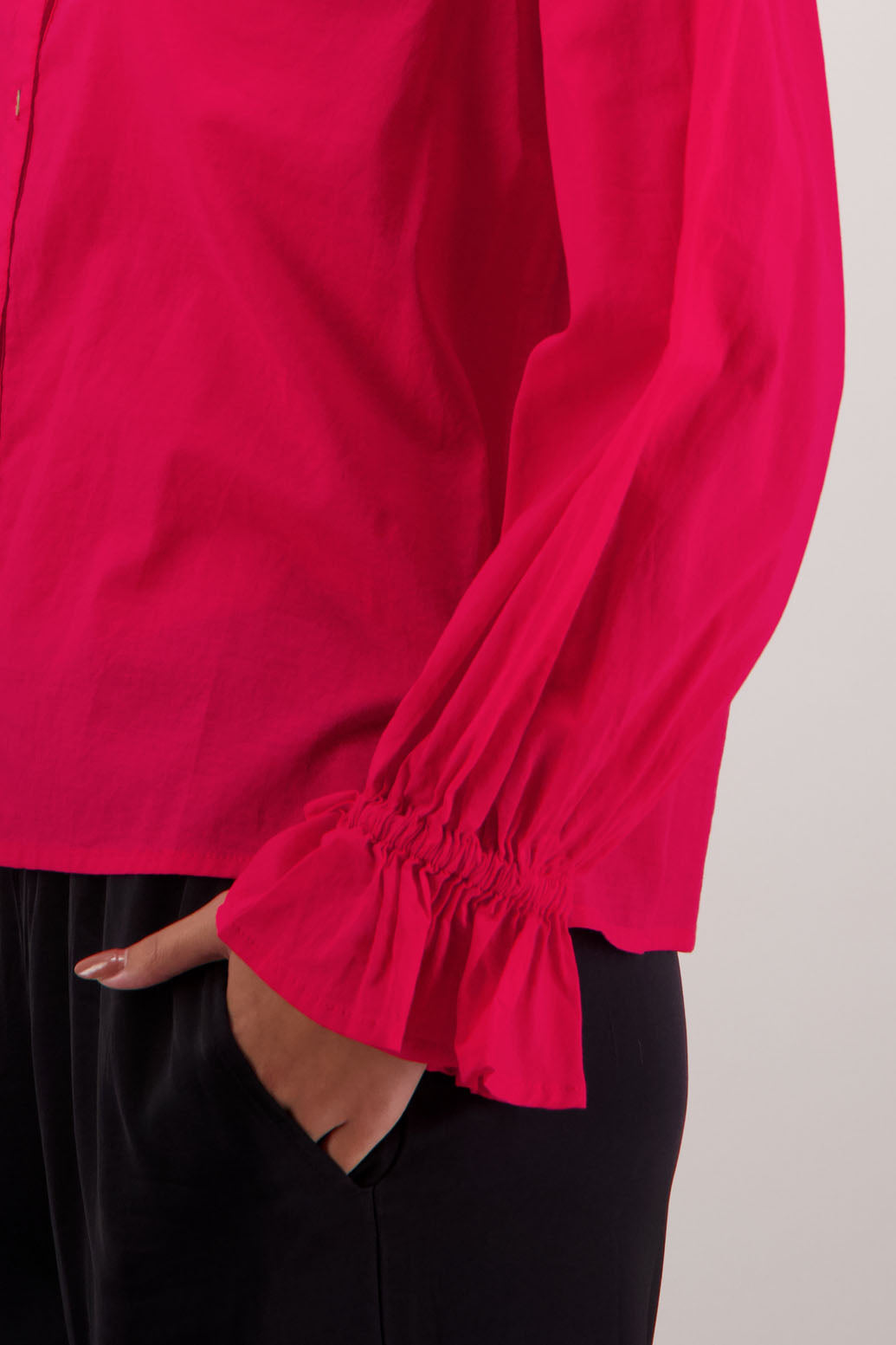 Briarwood NZ.Red long sleeve shirt, Elasticated sleeves, Ruffles around neck, Buttoned through