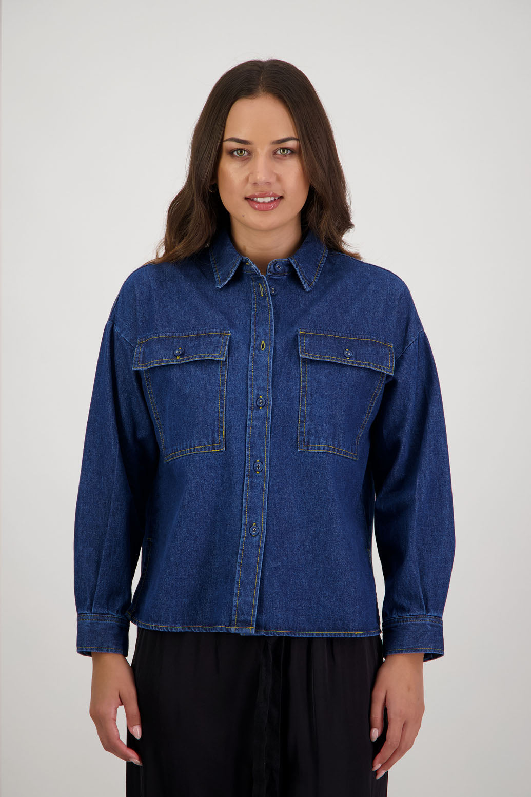 Rock Denim Shirt by Briarwood NZ. 100% cotton shirt with long sleeves, split sides, pockets on the front and longer at the back