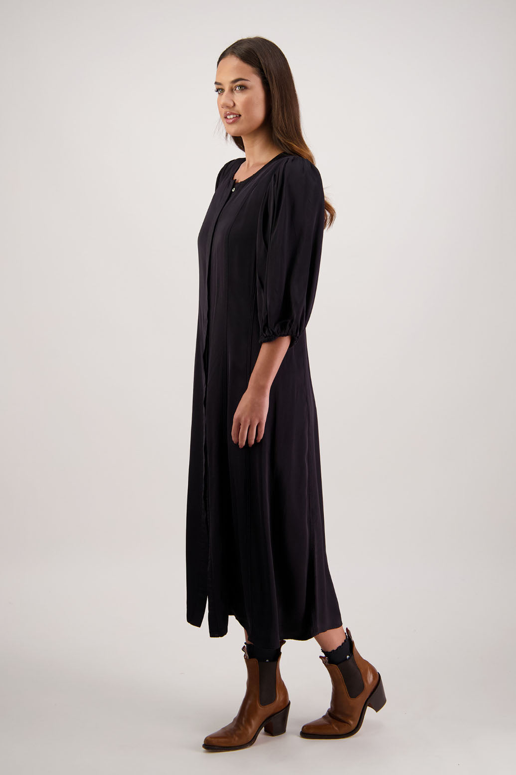 Romy Dress in Black by Briarwood NZ. 100% viscose dress, button through full length, 3/4 length sleeves, stitched shaped panels front & back, no collar