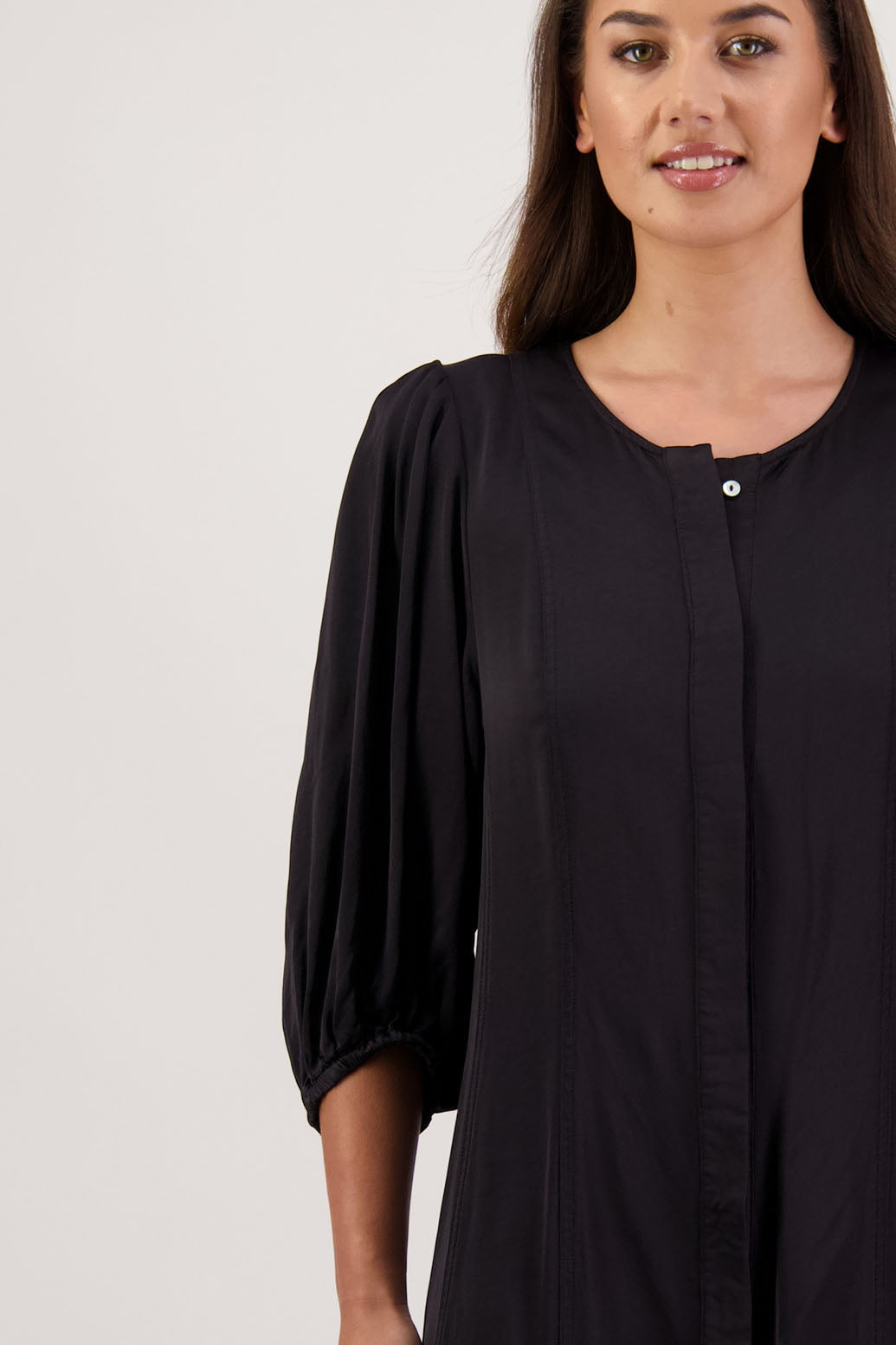 Romy Dress in Black by Briarwood NZ. 100% viscose dress, button through full length, 3/4 length sleeves, stitched shaped panels front & back, no collar
