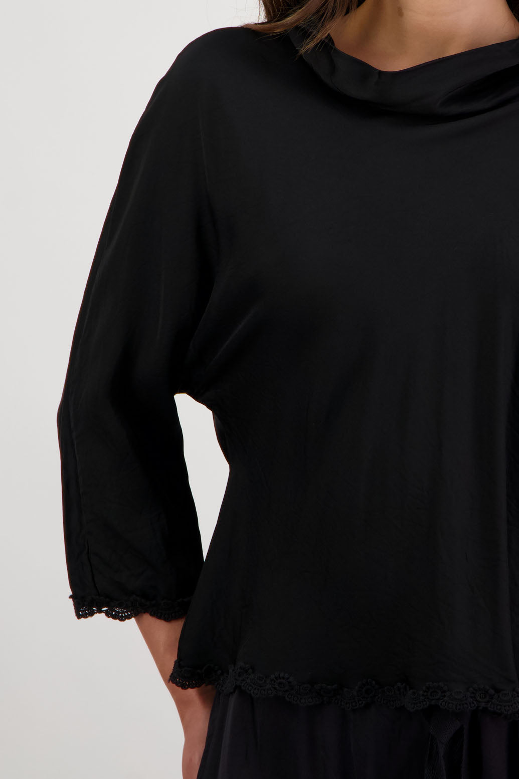Rosanna Top in Black by Briarwood NZ. 100% viscose topwith roll neck, 3/4 sleeves, bias cut, lace trim