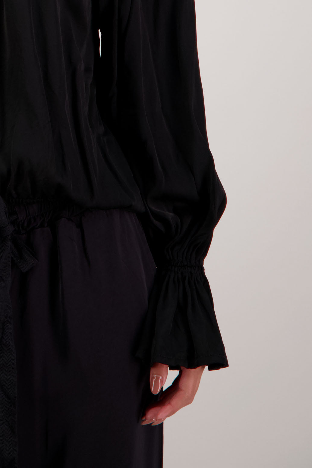 Rosemarie Top in Black by Briarwood NZ. 100% viscose top with 3 panel gathered neck, full length sleeves with ruffle, elasticated waistband