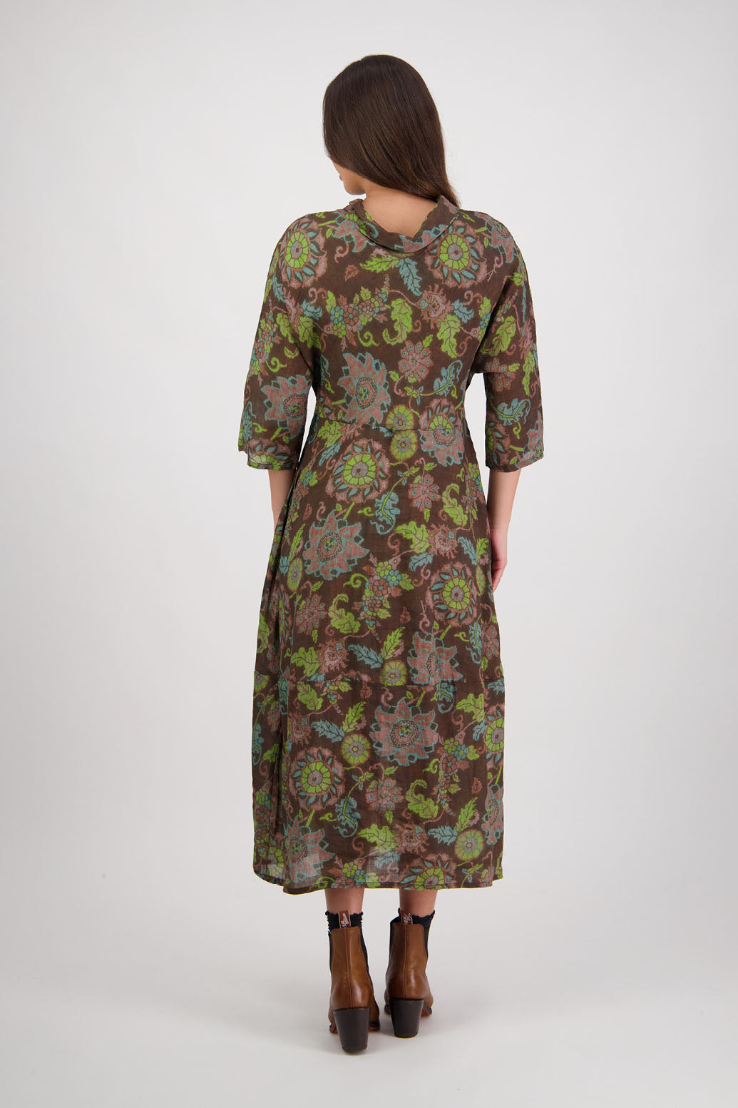 Rowena Dress in Brown Floral by Briarwood NZ. 100% Ramie dress, roll neck, bias cut top, puff hem start, 3/4 sleeves, pockets, lined