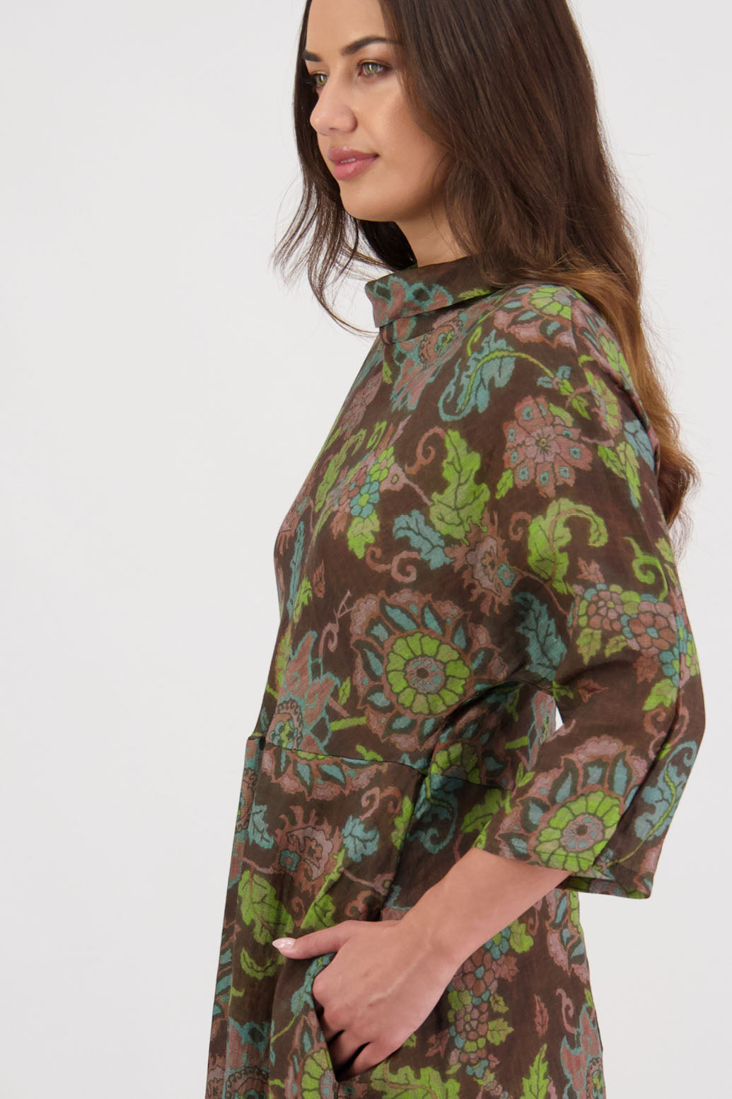 Rowena Dress in Brown Floral by Briarwood NZ. 100% Ramie dress, roll neck, bias cut top, puff hem start, 3/4 sleeves, pockets, lined