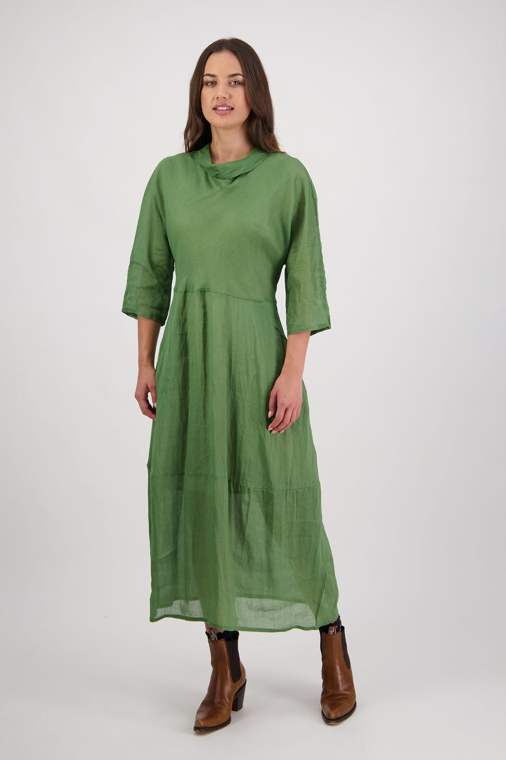 Rowena Dress in Grass by Briarwood NZ. 100% Ramie dress, roll neck, bias cut top, puff hem start, 3/4 sleeves, pockets, lined