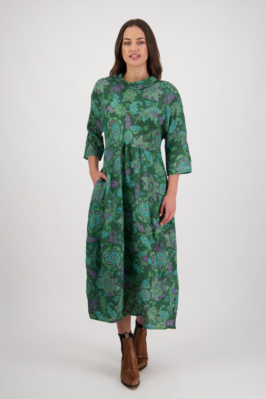 Rowena Dress in Green Floral by Briarwood NZ. 100% Ramie dress, roll neck, bias cut top, puff hem start, 3/4 sleeves, pockets, lined