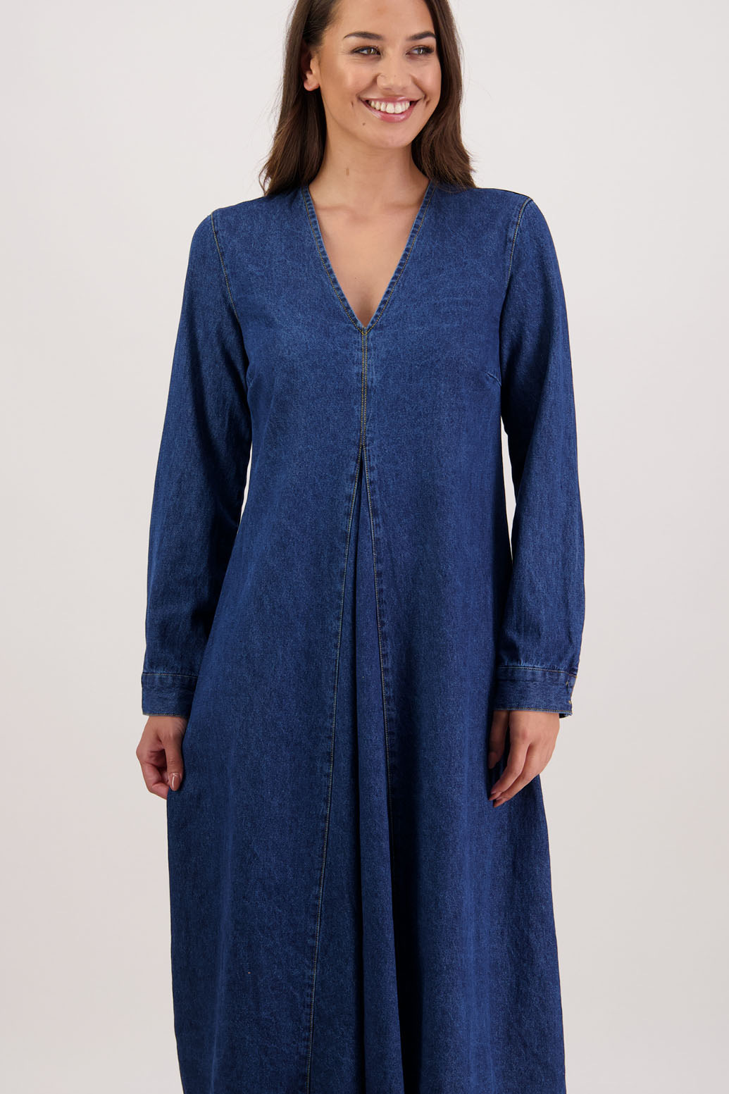 Roxie Denim Dress by Briarwood NZ. 100% cotton dress with V neck, full length sleeves with button closure, inset panel front & back