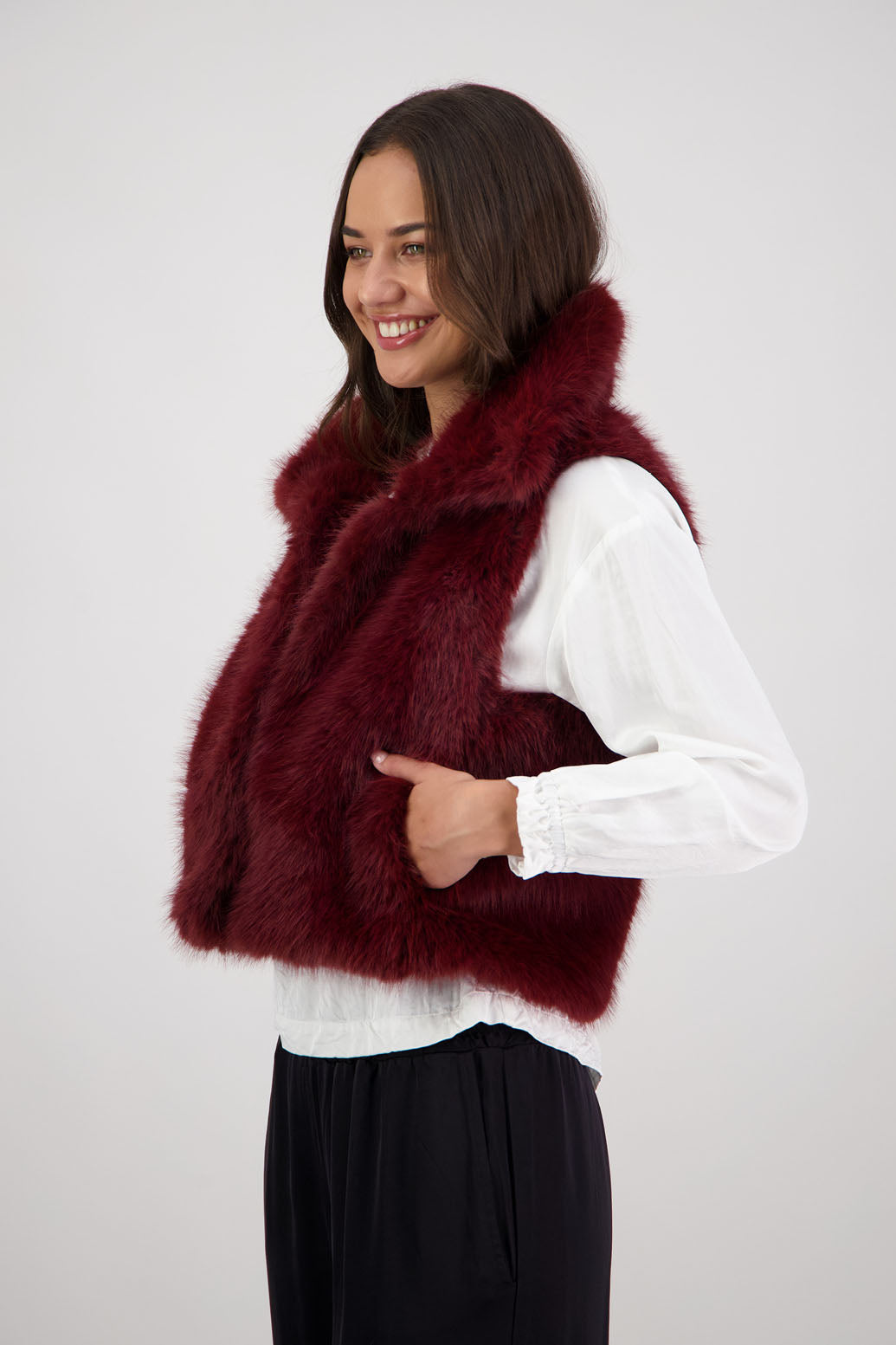 Royal Fluffy Vest in Red by Briarwood NZ. Fluffy faux fur polyester vest, collar, hook and eye closure, pockets