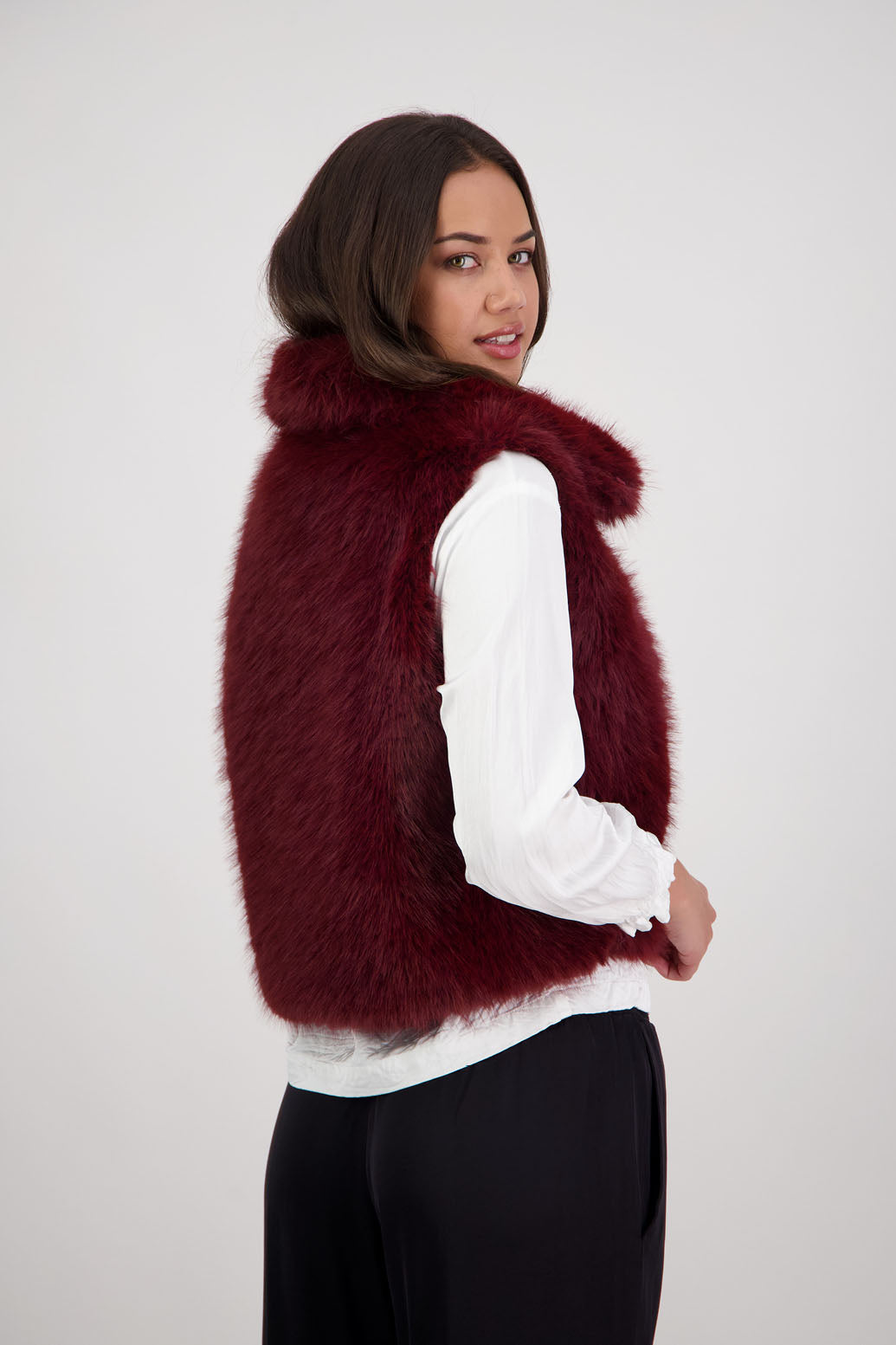 Royal Fluffy Vest in Red by Briarwood NZ. Fluffy faux fur polyester vest, collar, hook and eye closure, pockets