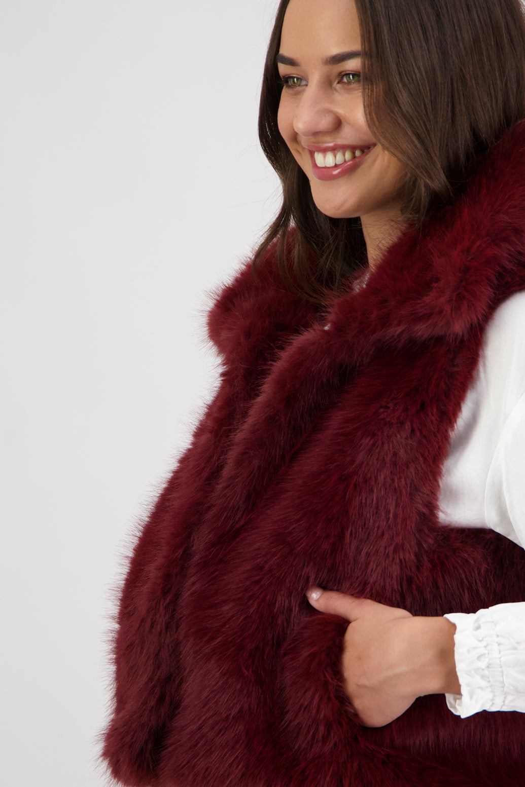 Royal Fluffy Vest in Red by Briarwood NZ. Fluffy faux fur polyester vest, collar, hook and eye closure, pockets