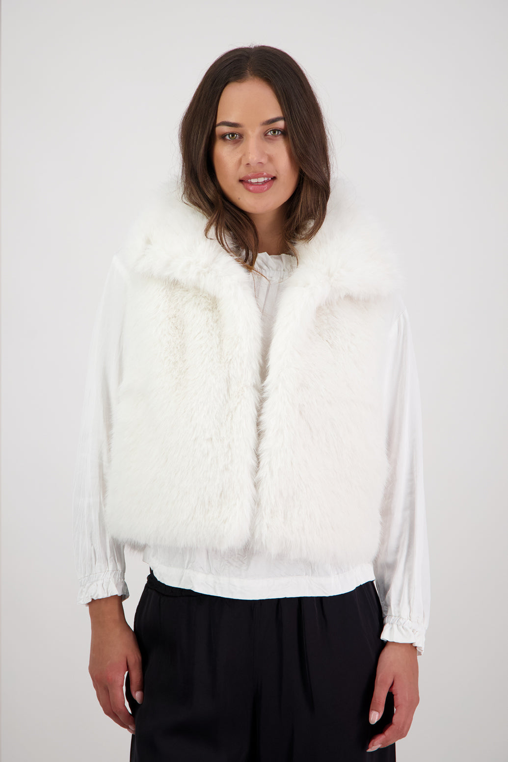 Royal Fluffy Vest in White by Briarwood NZ. Fluffy faux fur polyester vest, collar, hook and eye closure, pockets
