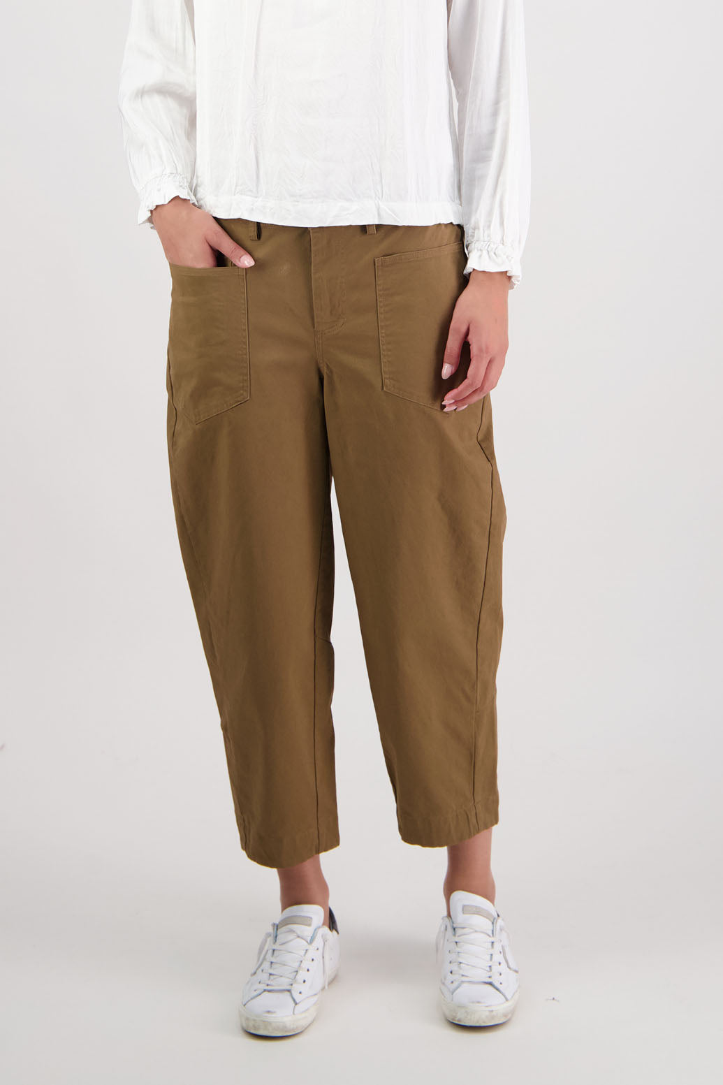 Ruby pant in Tan by Briarwood NZ. 97% Cotton pant with spandex. Slight barrel leg and cropped length, zip fly, elasticated through the back fro comfort, pockets front and back