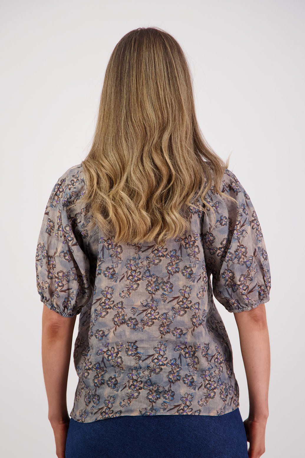 Womens Ramie shirt with pleats across the shoulders, soft puff elbow length sleeves and Grandpa collar. Briarwood NZ. Stevie, Denim Daisy print