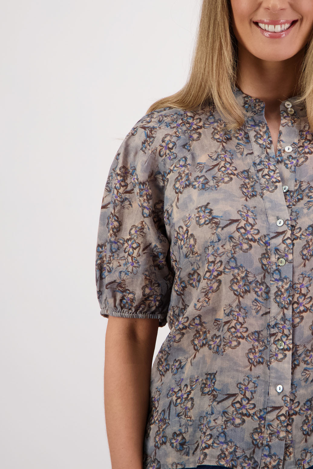 Womens Ramie shirt with pleats across the shoulders, soft puff elbow length sleeves and Grandpa collar. Briarwood NZ. Stevie, Denim Daisy print