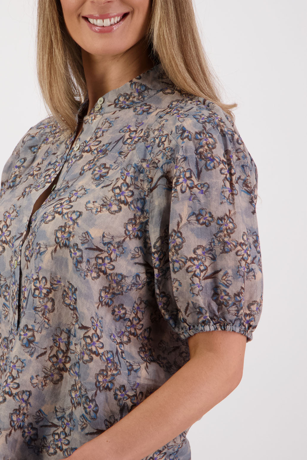 Womens Ramie shirt with pleats across the shoulders, soft puff elbow length sleeves and Grandpa collar. Briarwood NZ. Stevie, Denim Daisy print