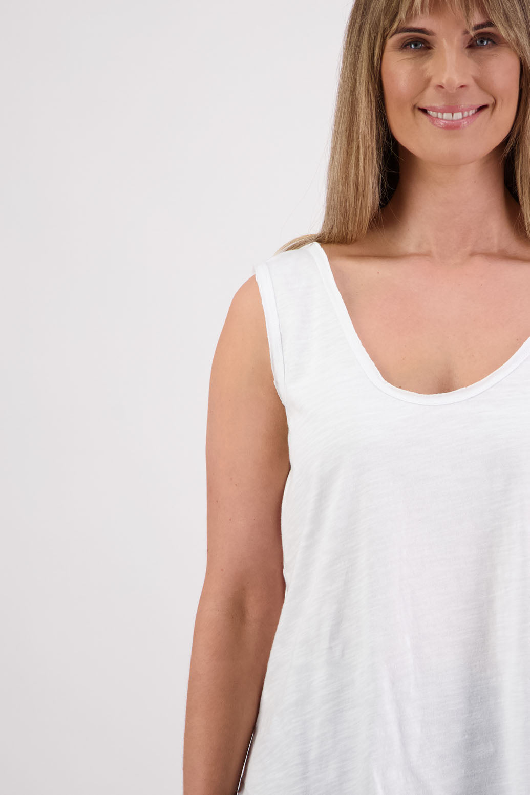 Womens cotton singlet with shaped hem and raw edges. Briarwood NZ. Sala, White