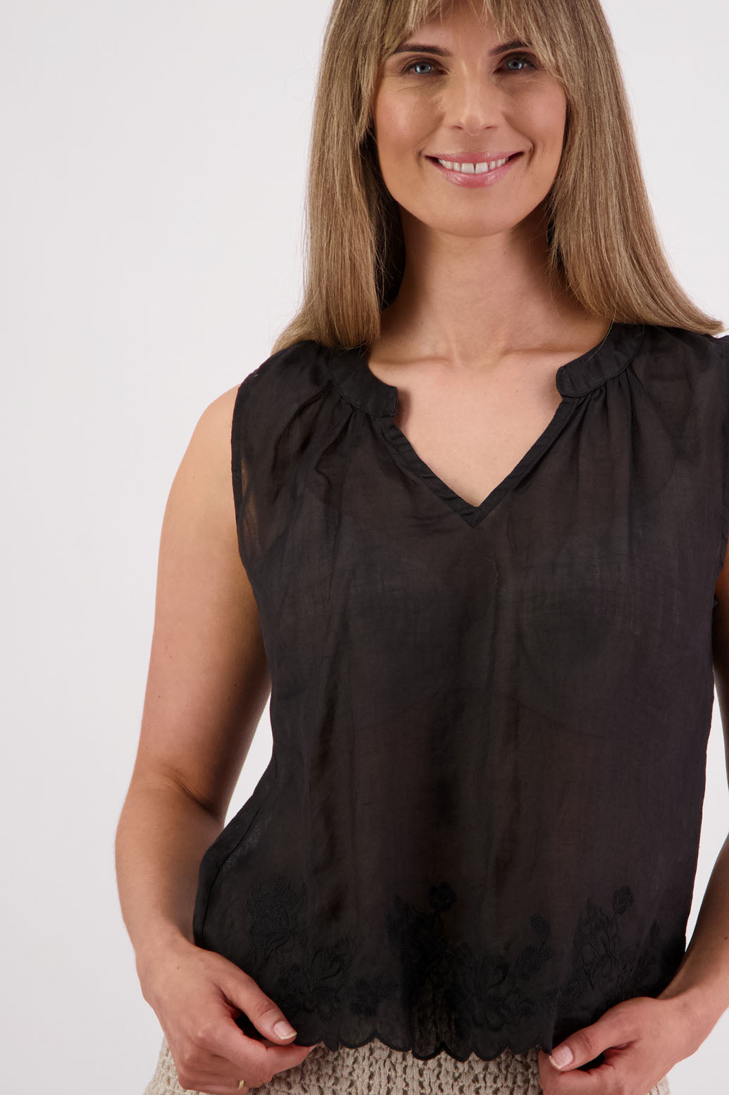 Briarwood NZ Sara Top. Black, sleeveless, V neck, embroidered bottom