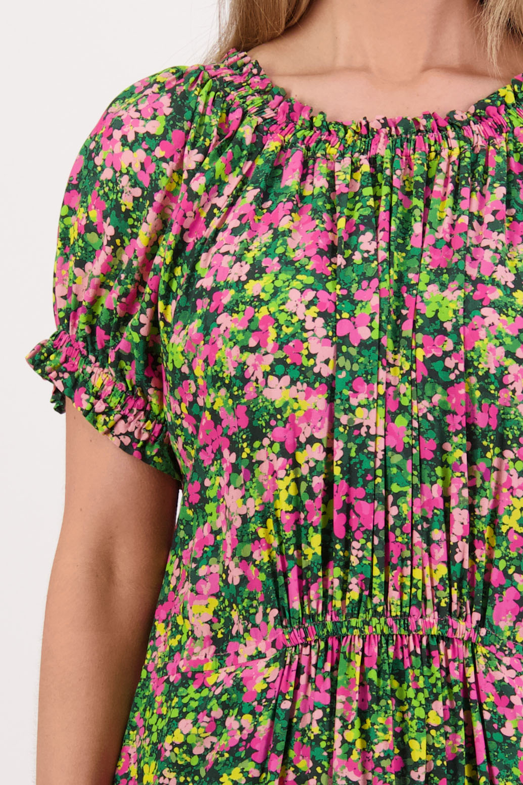Womens long pansy print dress with slightly gathered centre panel, Ruffle around the neck and sleeves and pockets. Viscose. Briarwood NZ. Sasha
