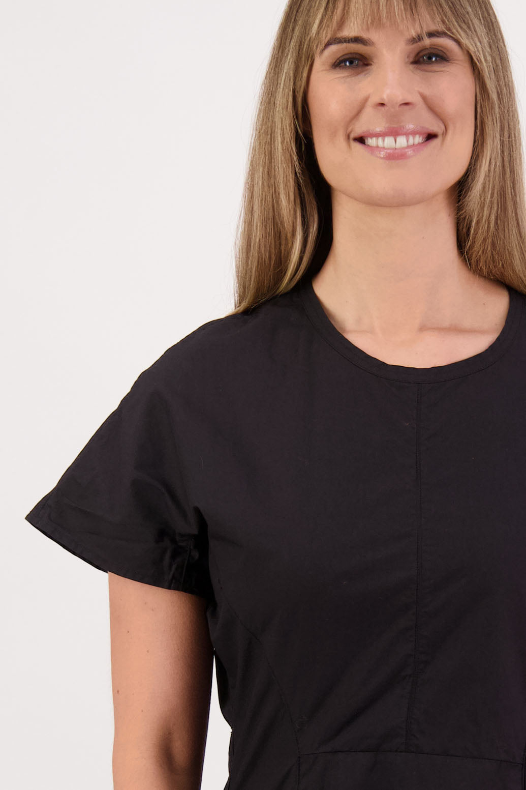 Womens shaped and waisted black dress with A-Line skirt, cap sleeves and zip up the back. Briarwood NZ. Cotton Poplin. Saunders