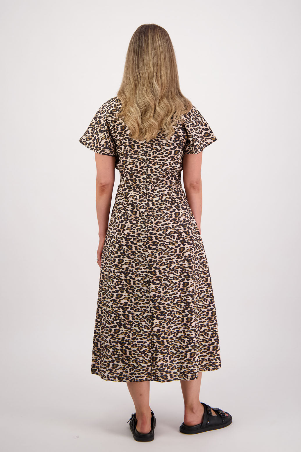 Womens shaped and waisted dress with A-Line skirt, cap sleeves and zip up the back. Briarwood NZ. Cotton Poplin. Leopard Print. Saunders