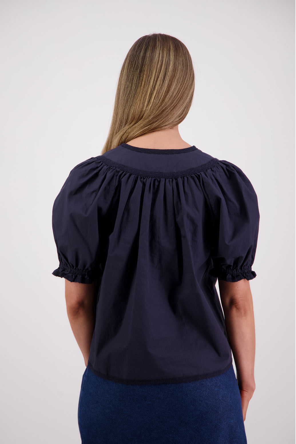 Womens Ink short sleeve top with soft gathering onto yolk with lace trim around the sleeves, hem + yolk. Briarwood NZ. Cotton Poplin / Lace. Selma