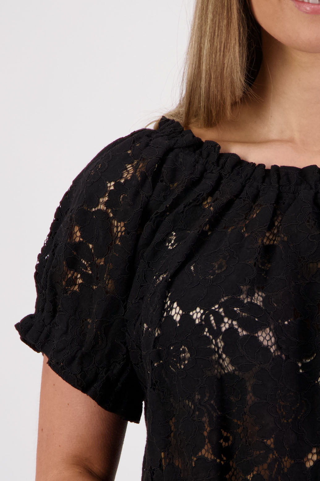 Womens black lace top with short sleeves elasticated neck and sleeves with slight ruffle. Briarwood NZ. Serenity Black