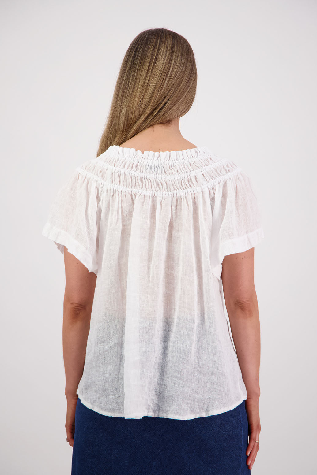 Womens longline linen top with short sleeves and elastic panels around neckline. Briarwood NZ. Shelley, White