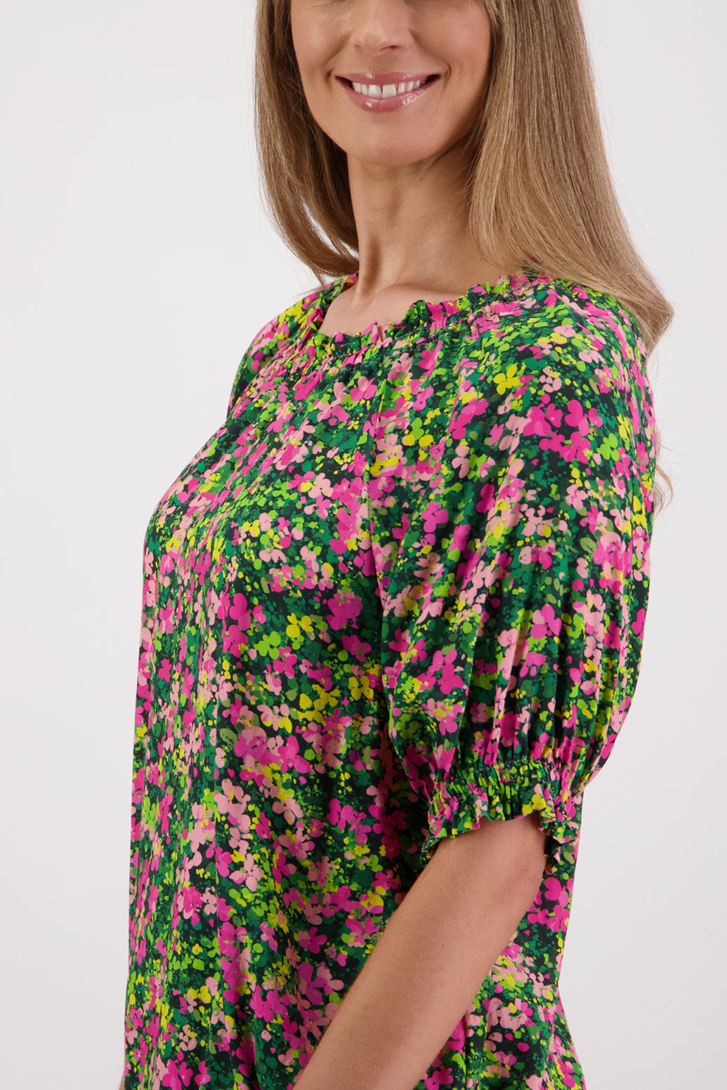 Womens longline viscose top with elbow length sleeves and elasticated neck and sleeves with slight ruffle. Briarwood NZ. Simone. Pansy Print