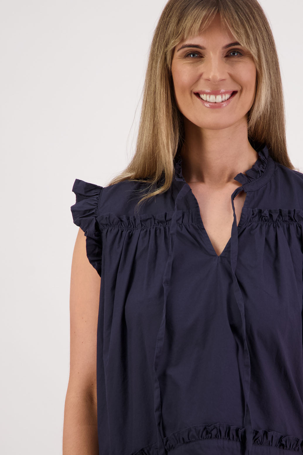 Womens Ink/Navy short sleeve wide top with V neck + tie, and small ruffle on the yolk, hem and sleeves. Briarwood NZ. Cotton Poplin. Skye