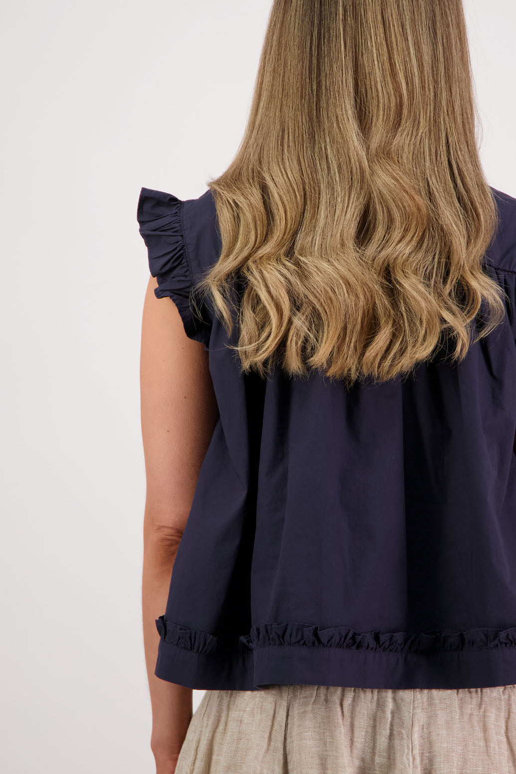 Womens Ink/Navy short sleeve wide top with V neck + tie, and small ruffle on the yolk, hem and sleeves. Briarwood NZ. Cotton Poplin. Skye