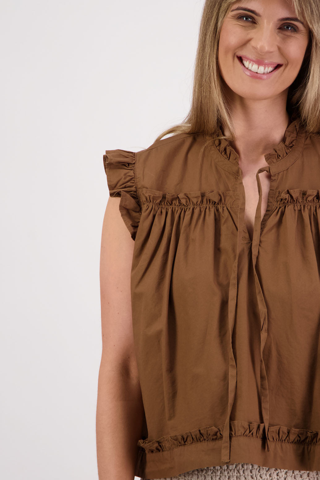 Womens Tan short sleeve wide top with V neck + tie, and small ruffle on the yolk, hem and sleeves. Briarwood NZ. Cotton Poplin. Skye