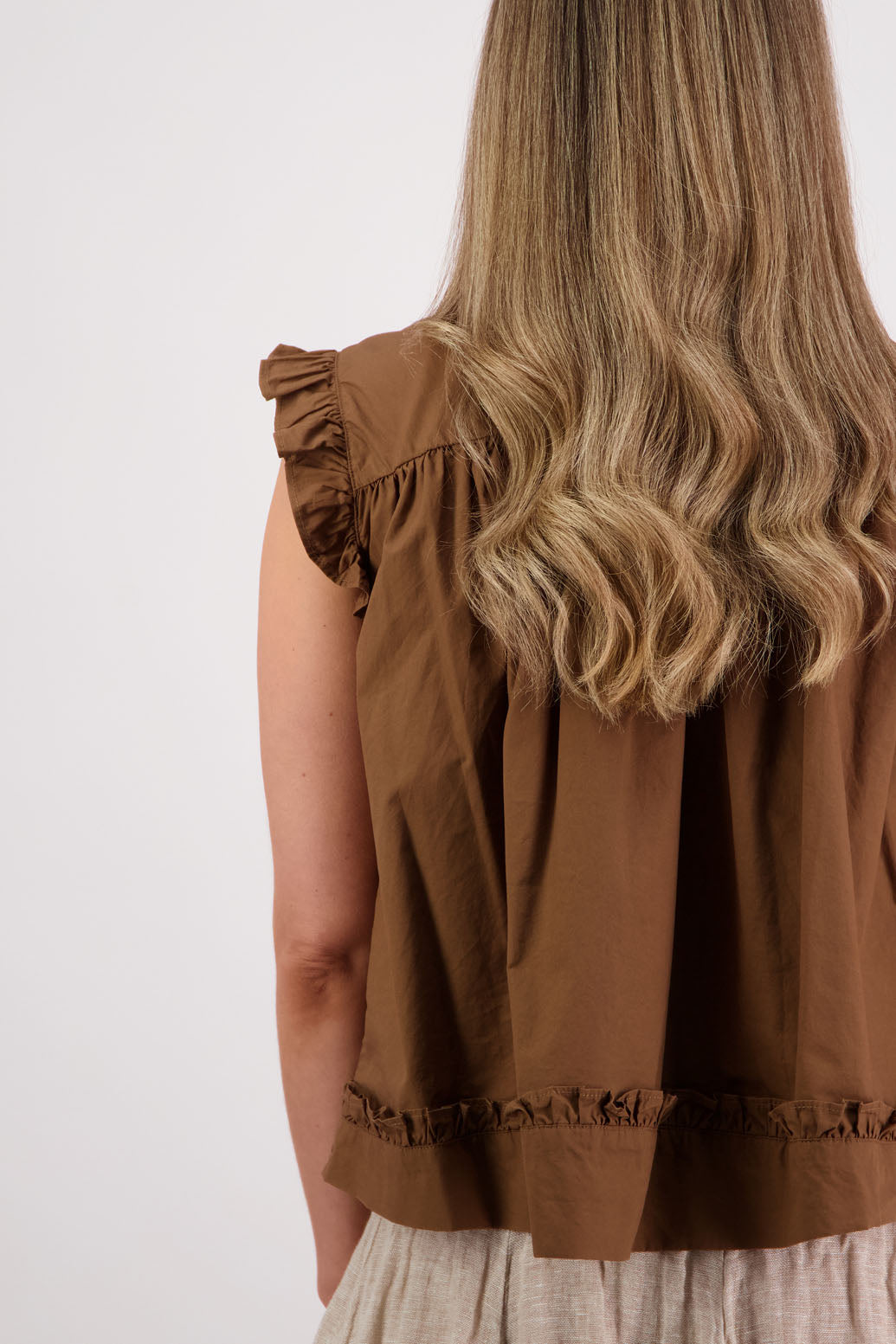 Womens Tan short sleeve wide top with V neck + tie, and small ruffle on the yolk, hem and sleeves. Briarwood NZ. Cotton Poplin. Skye