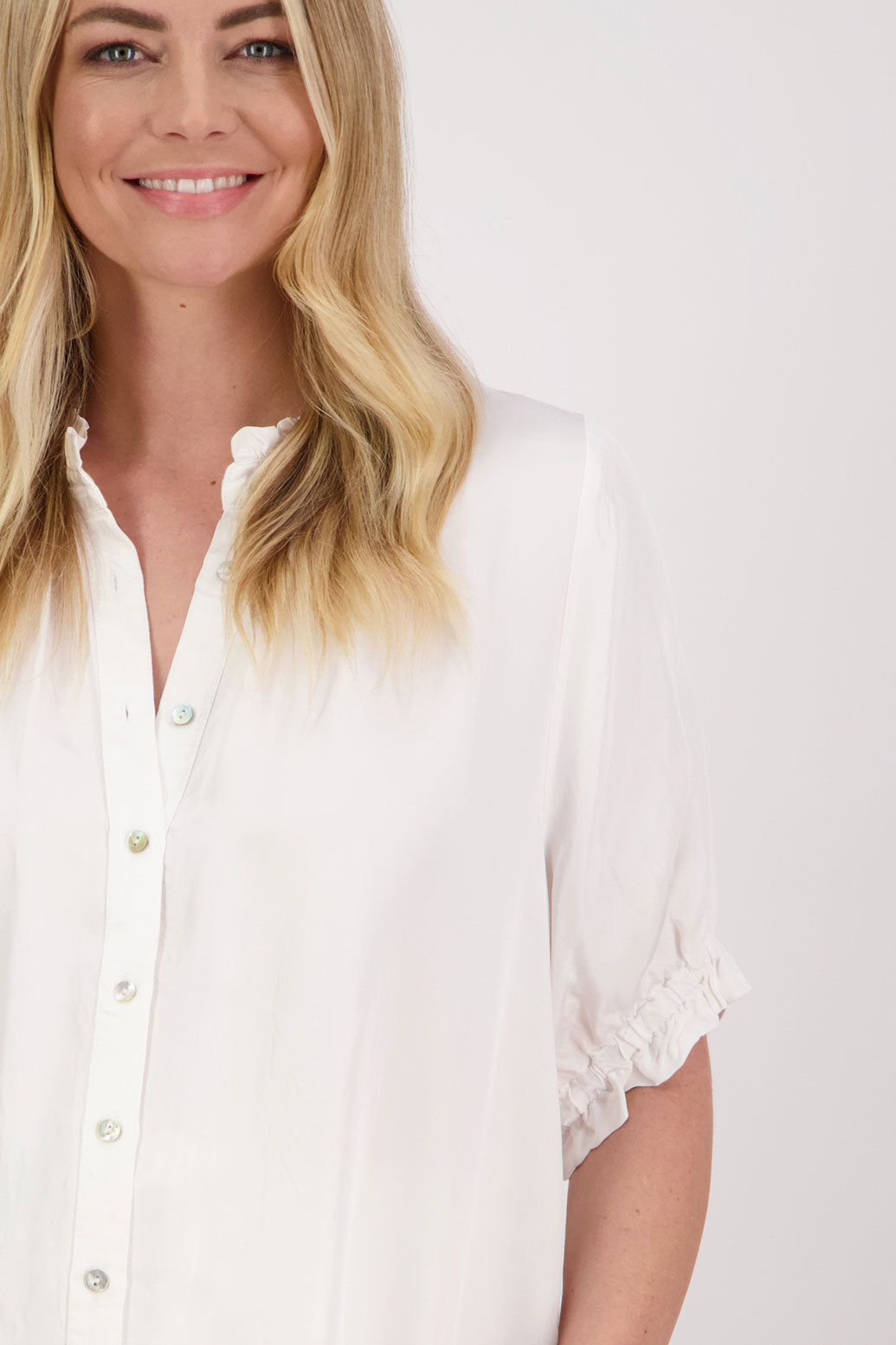 Sophie Womens Viscose Short Sleeve Shirt with Ruffle sleeves and neck. Ivory