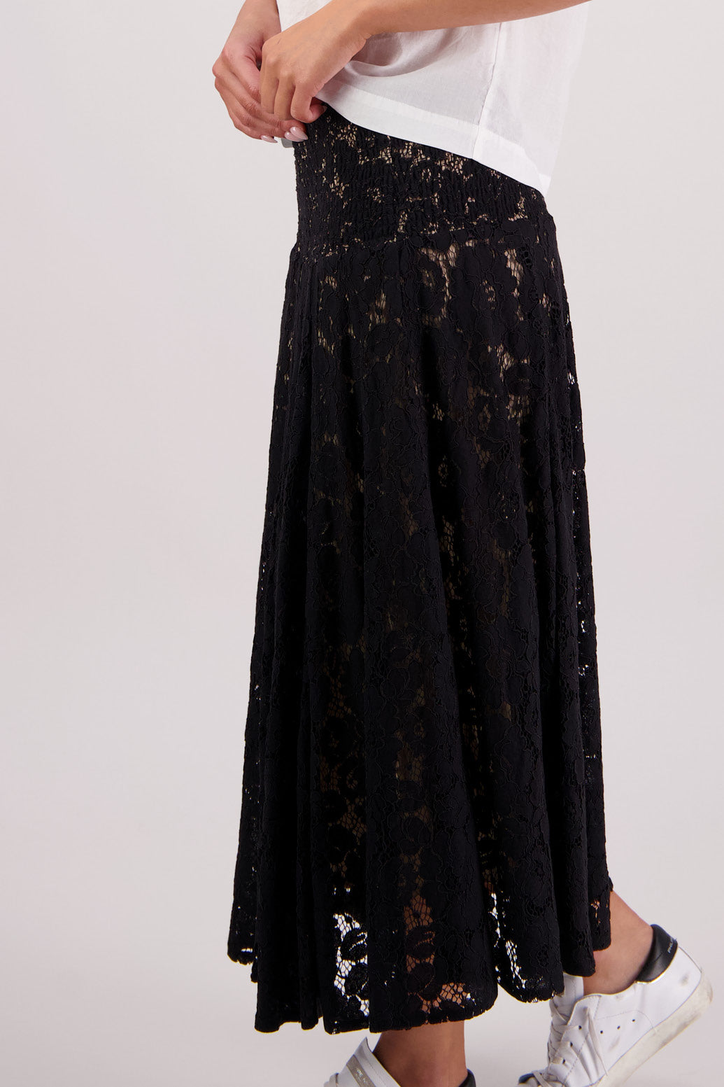 Close up side view of Briarwood Sparkle Lace Skirt in Black.