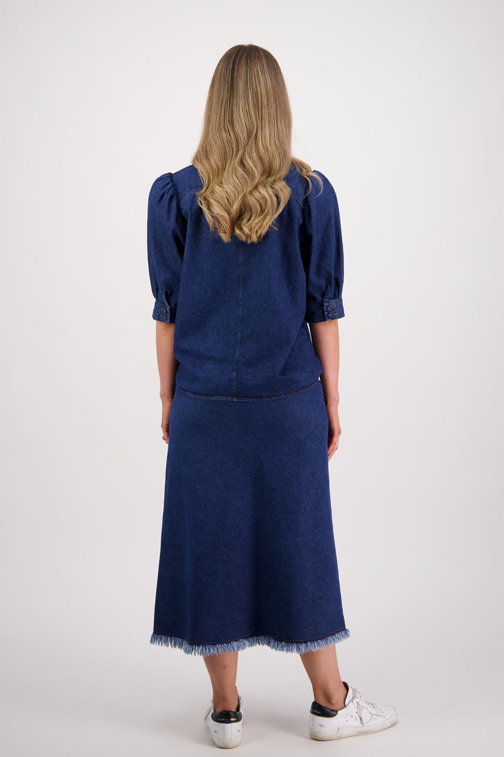 Womens denim skirt with raw hem, bias cut and elasticated waist. Briarwood NZ