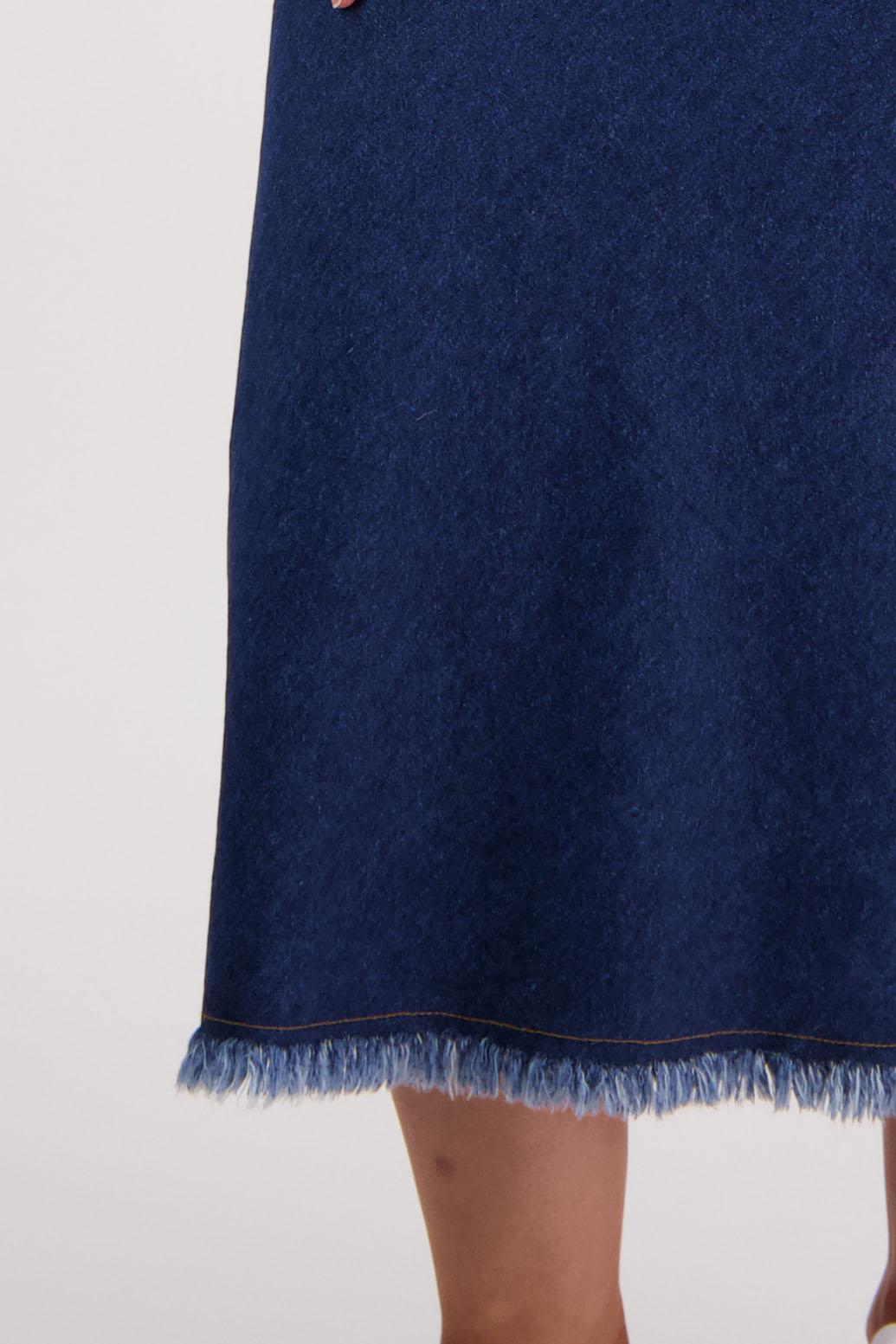 Womens denim skirt with raw hem, bias cut and elasticated waist. Briarwood NZ