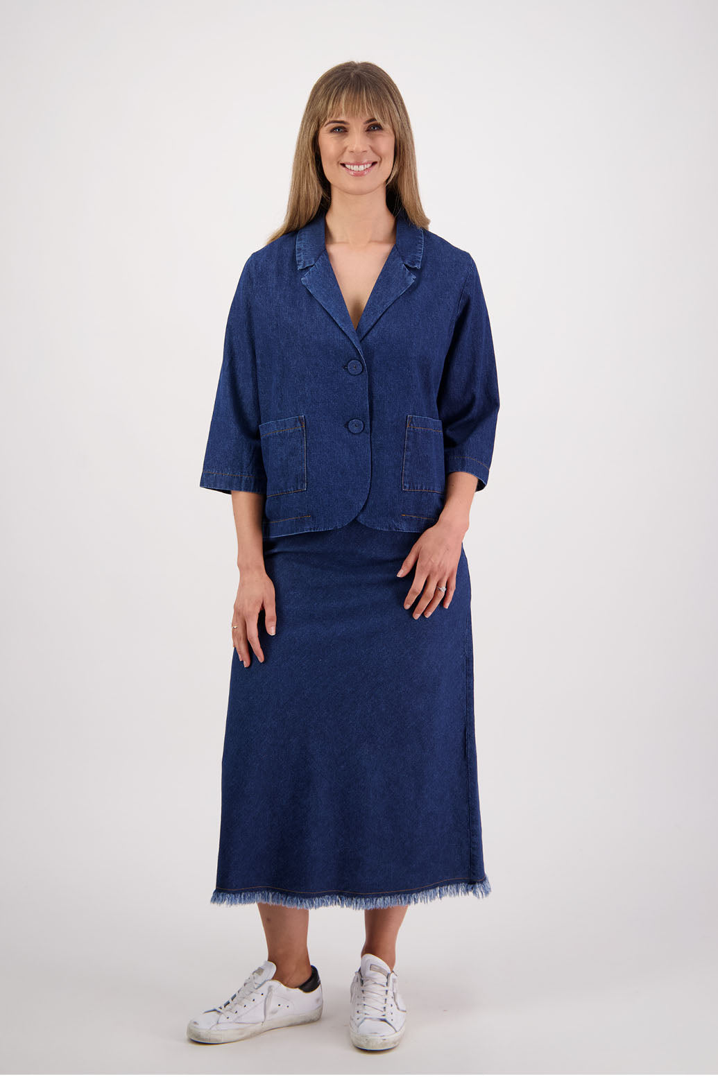 Womens denim skirt with raw hem, bias cut and elasticated waist. Briarwood NZ