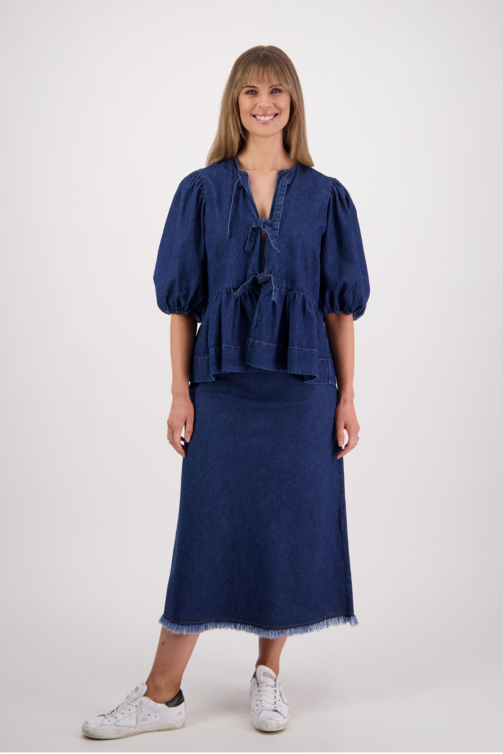 Womens denim skirt with raw hem, bias cut and elasticated waist. Briarwood NZ