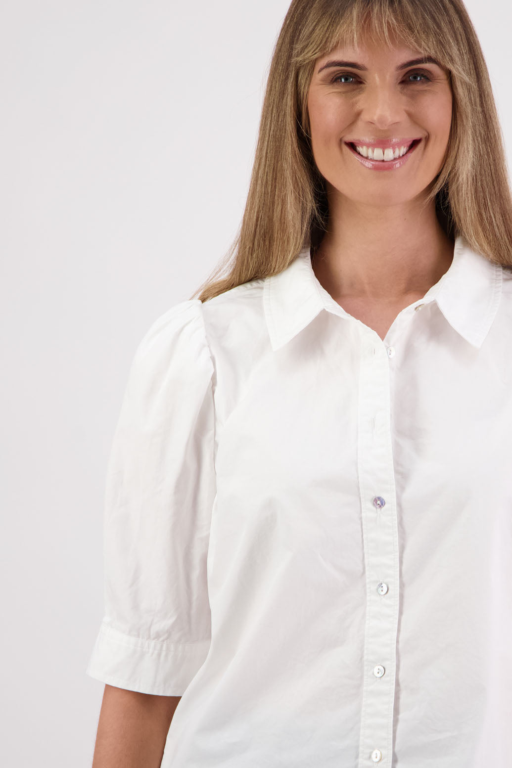 Womens Cotton Poplin White shirt with puff elbow length sleeves, covered buttons and slightly fitted. Briarwood NZ. Stella