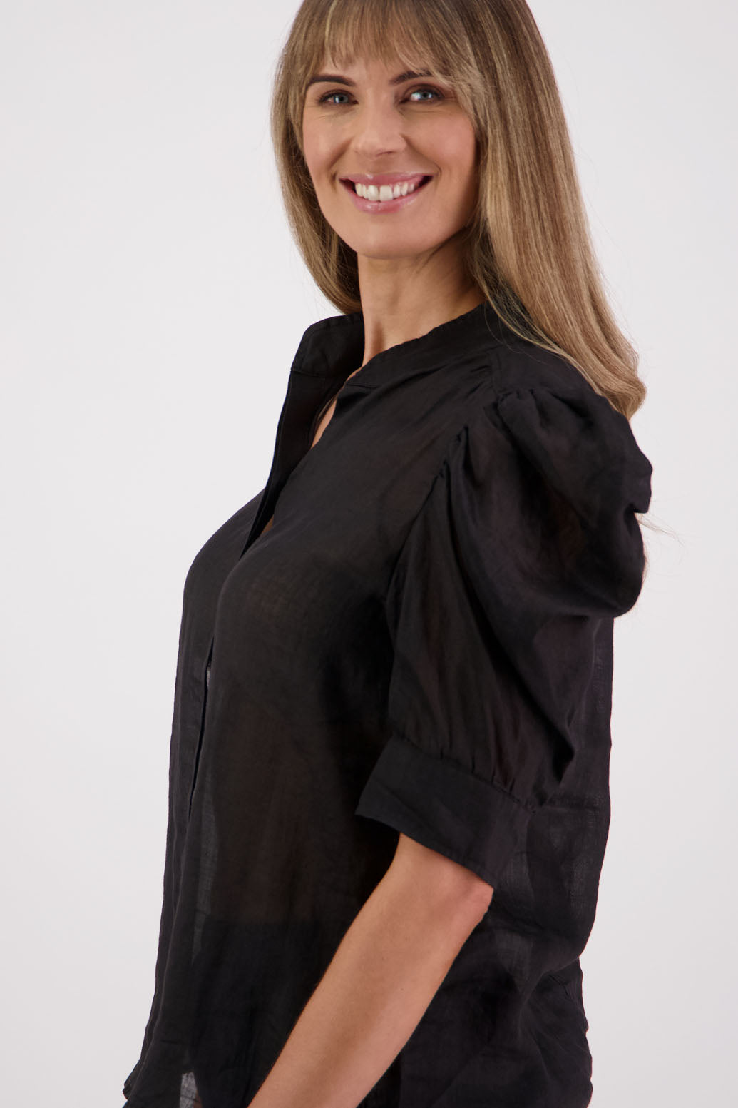 Womens Ramie Shirt with gathered puff elbow length sleeve and slight gathering across the back. Grandpa collar and slimmer fit. Briarwood NZ. Stevie Black