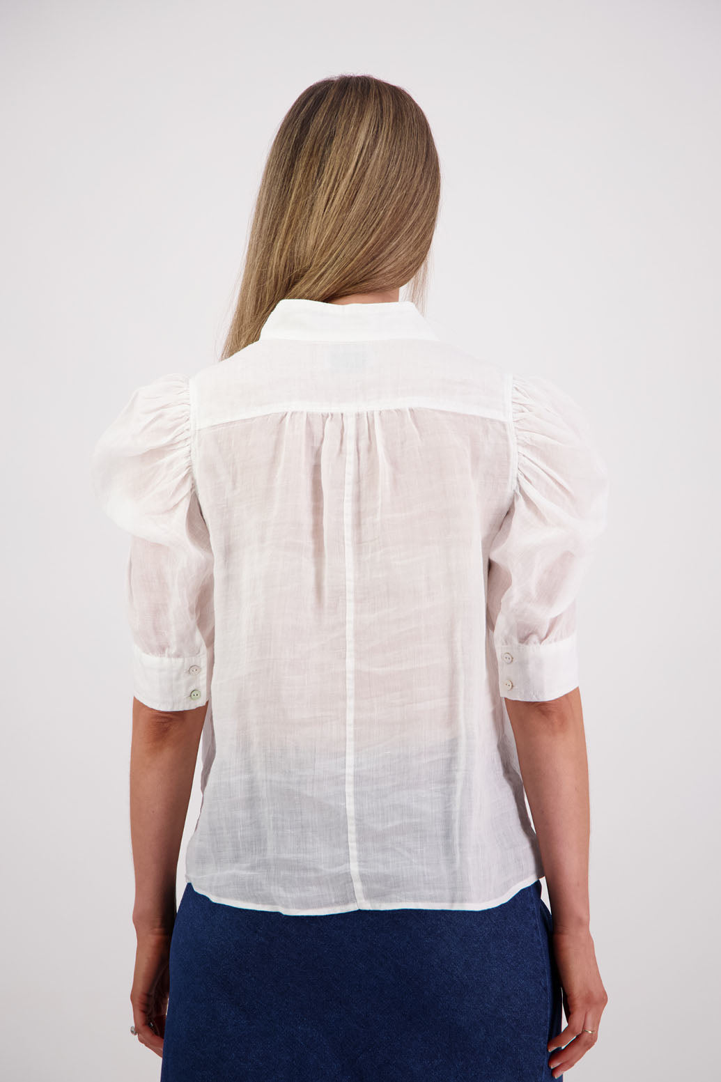 Womens Ramie Shirt with gathered puff elbow length sleeve and slight gathering across the back. Grandpa collar and slimmer fit. Briarwood NZ. Stevie White