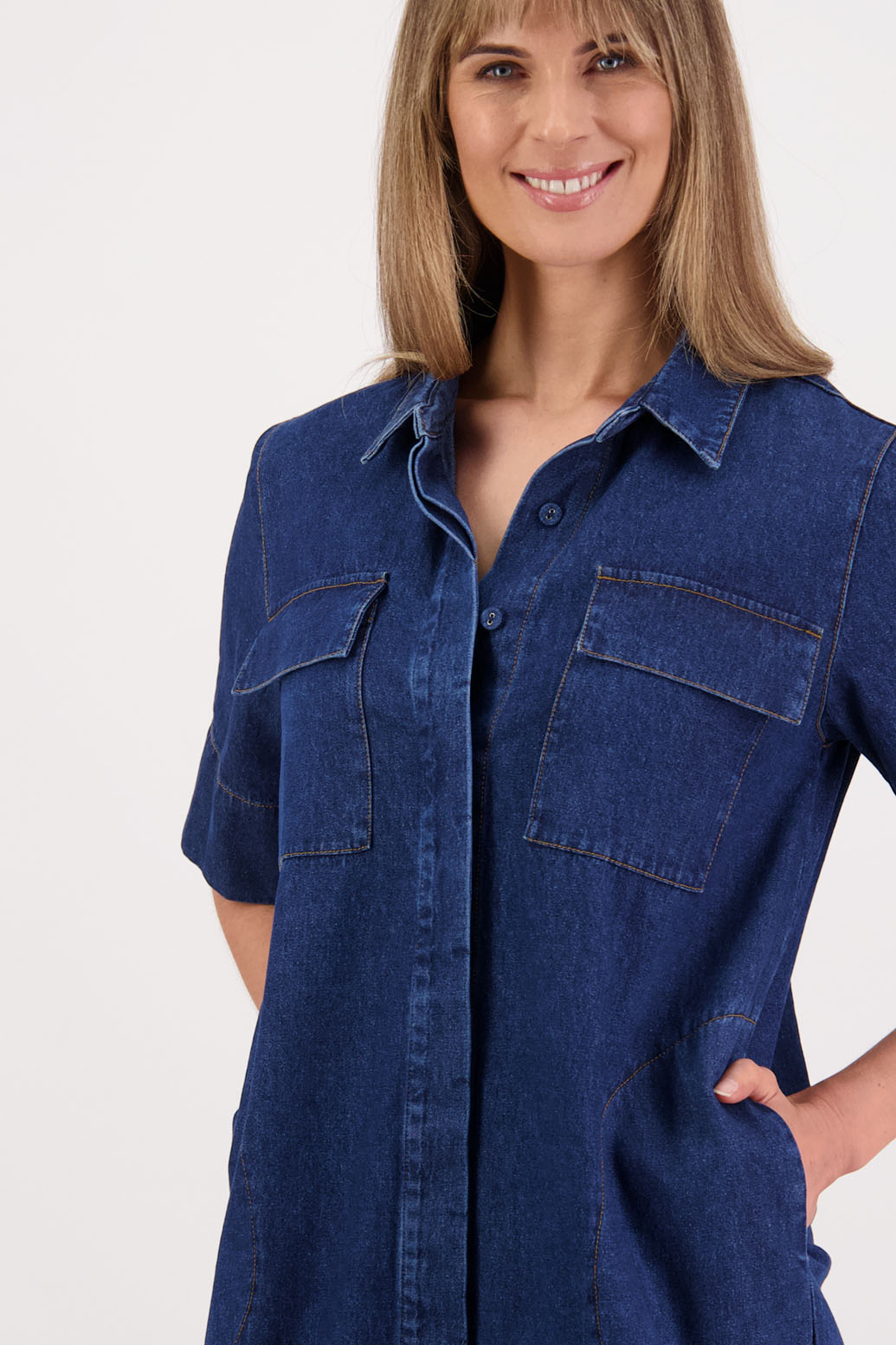 Womens Denim Dress with stitched on pockets, patch pockets and covered buttons. Straight skirt. Briarwood NZ