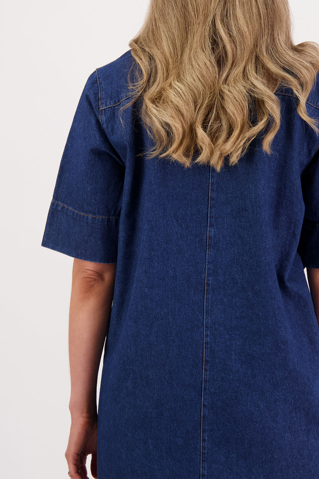 Womens Denim Dress with stitched on pockets, patch pockets and covered buttons. Straight skirt. Briarwood NZ