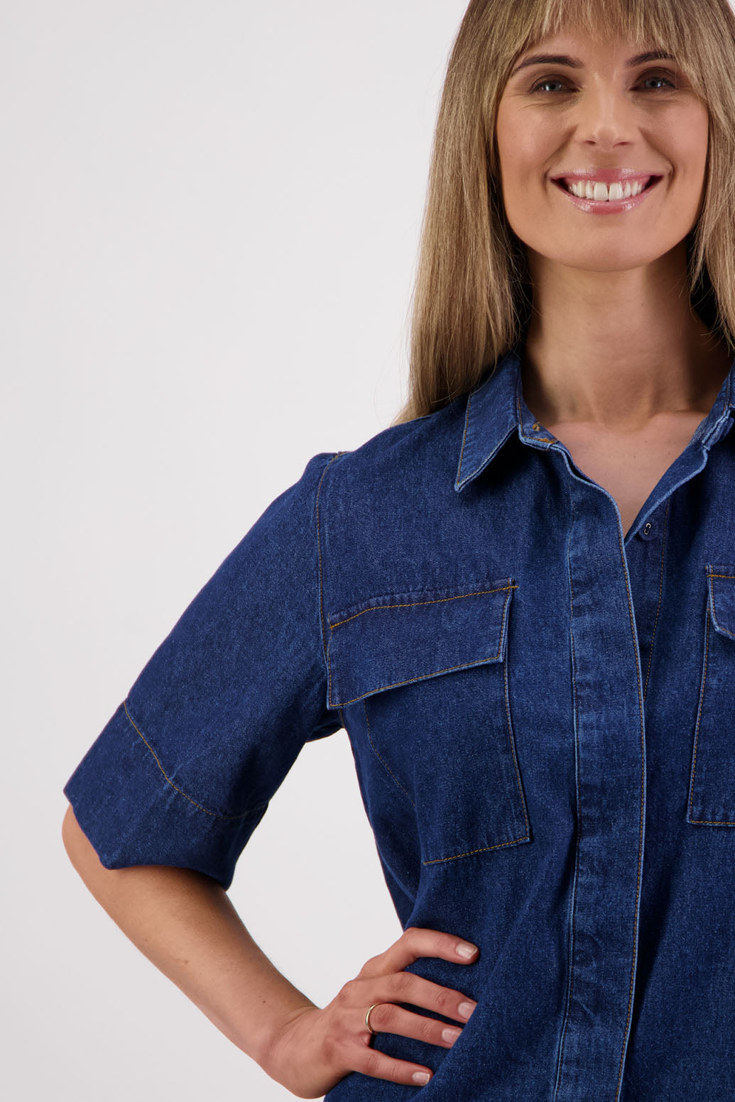 Womens box fit denim shirt with covered buttons, stitched on pockets and covered placket. Briarwood NZ. Syd