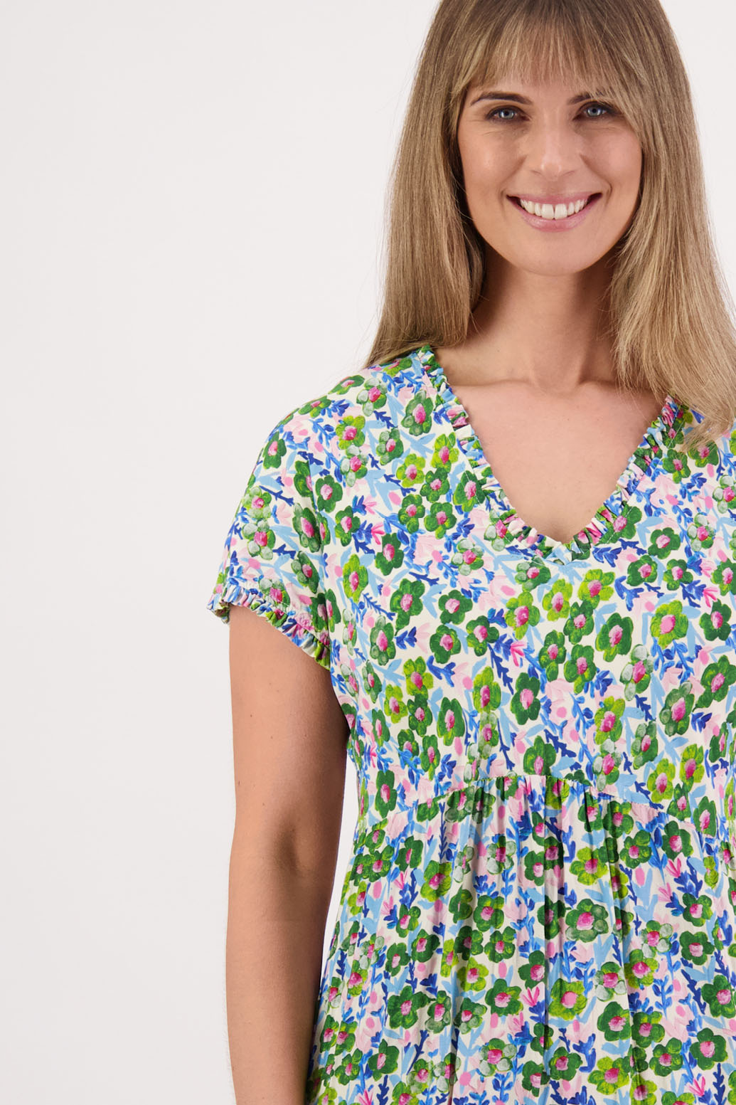 Womens midi dress with bias cut bust and v neck, straight skirt, shaped hem and ruffles around neck, sleeves and hem. Briarwood NZ. Viscose. Taylor. Daisy print