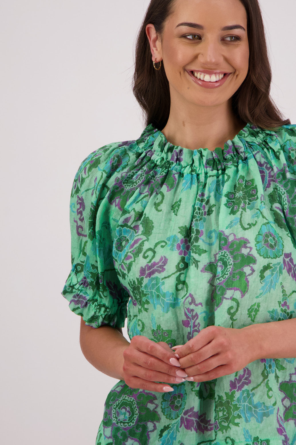 Close up of front view of Briarwood Teddy Top in green floral print.