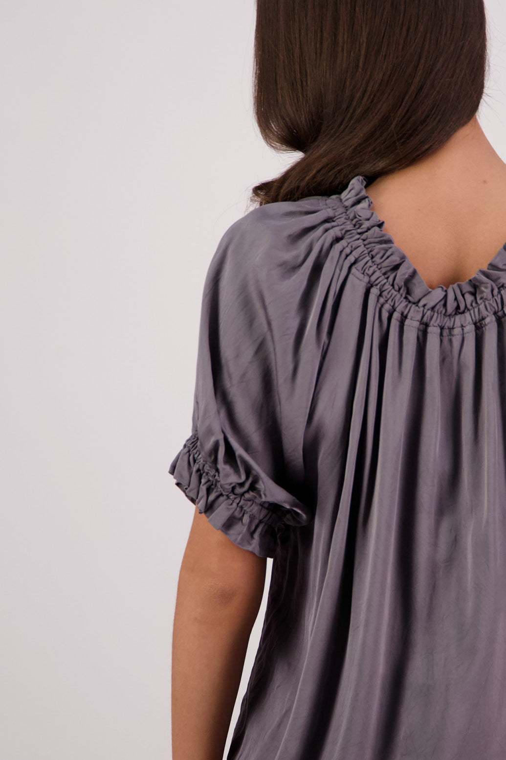 Closeup back view Briarwood Teddy top in silver.
