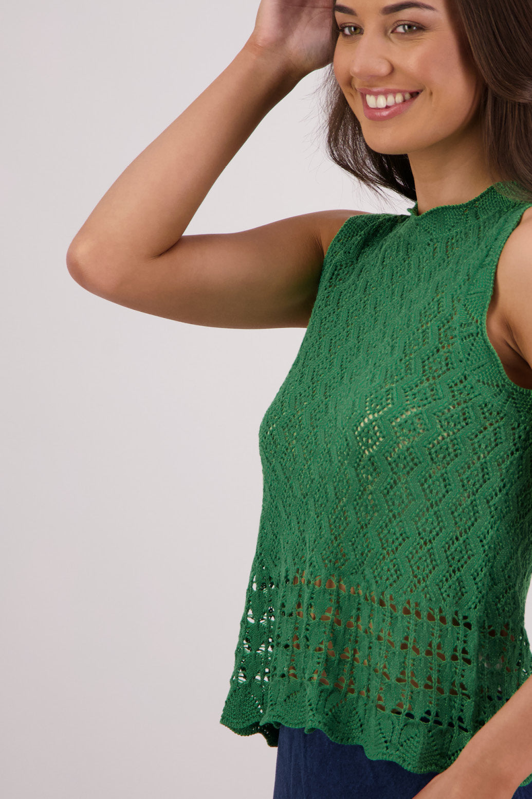Closeup side view Briarwood Temple Sleeveless Top in Green.