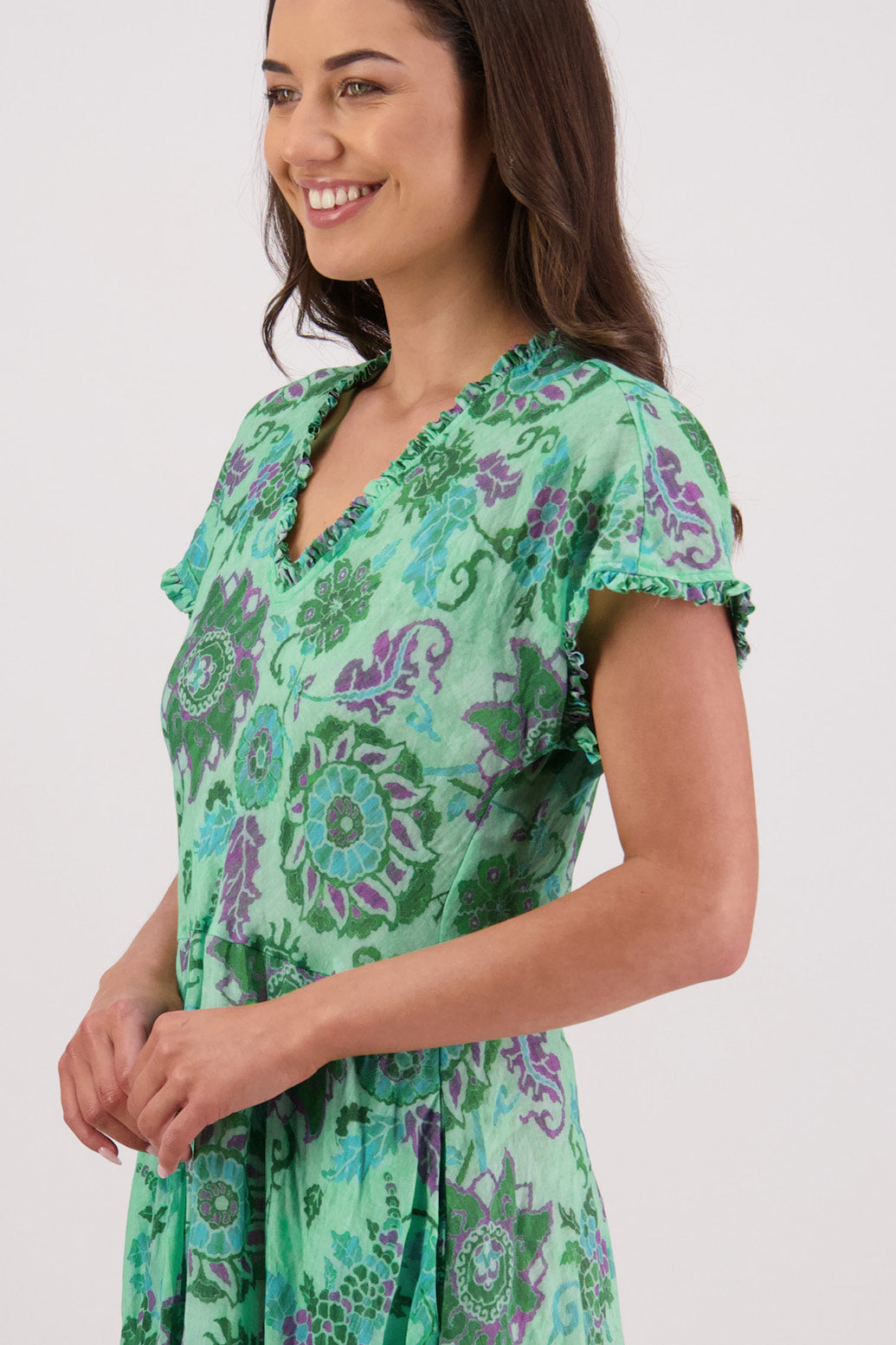 Close up of side view of Briarwood Tori Dress in Green Floral print.